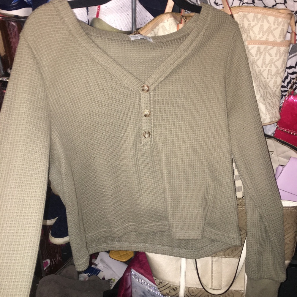 Olive Green Paper + Crane Top Size is X small but will fit a small / Medium